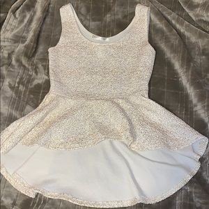 A white and gold shirt white floral long bottom